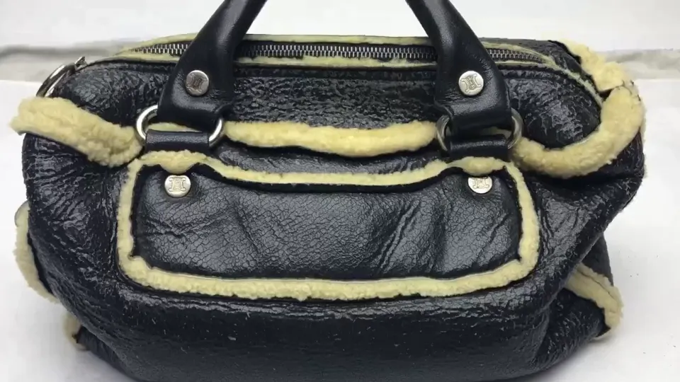 Celine coated shearling bag repair